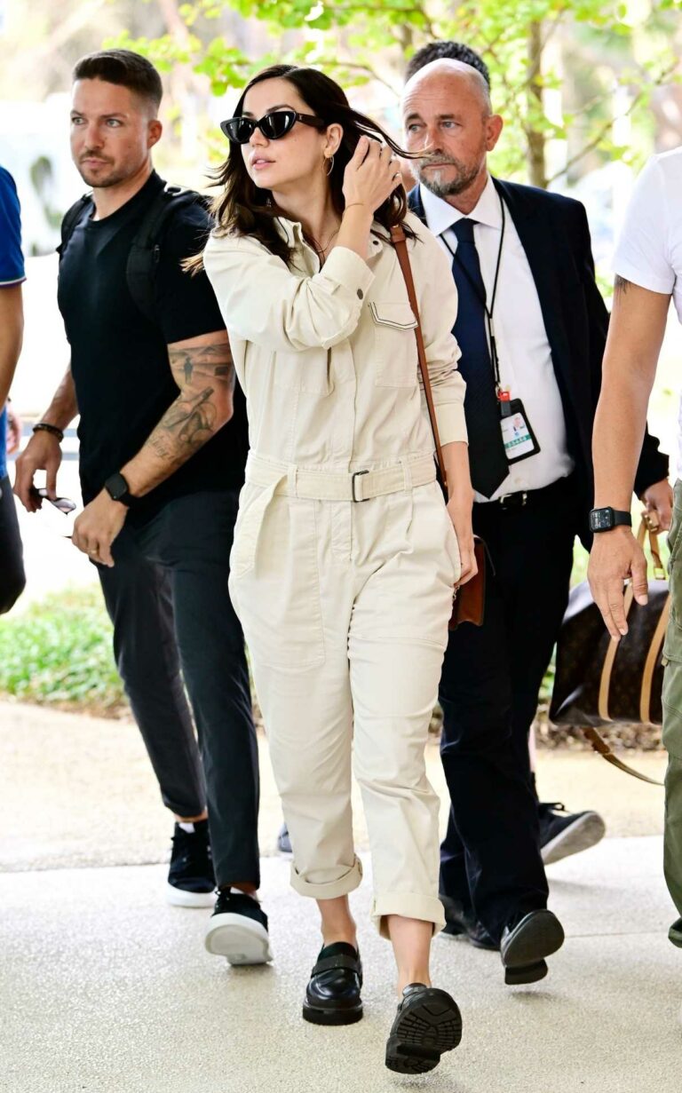 Ana de Armas in a Beige Jumpsuit Arrives at Venice Airport During the
