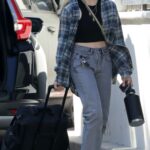Chloe Moretz in a Plaid Shirt Returns to Her Home in Los Angeles 09/29/2022