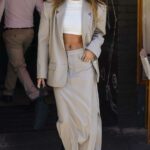 Hailey Bieber in a White Top Leaves the Sant Ambroeus Restaurant in New York 09/15/2022