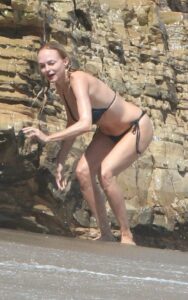 Heather Graham in a Black Bikini