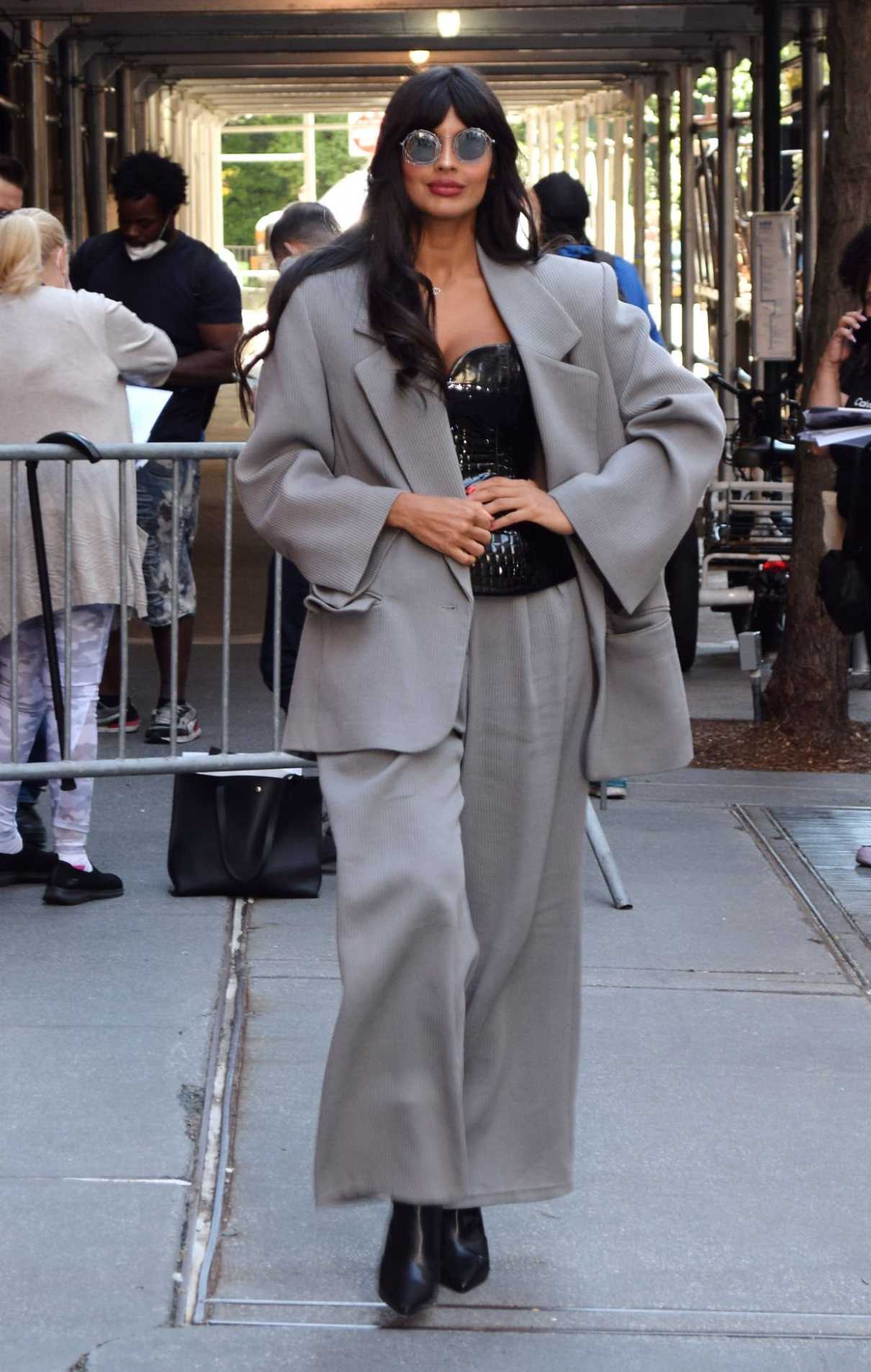 Jameela Jamil in a Grey Pantsuit