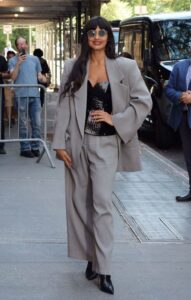 Jameela Jamil in a Grey Pantsuit