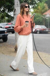 Kaia Gerber in an Orange Sweatshirt