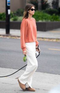 Kaia Gerber in an Orange Sweatshirt