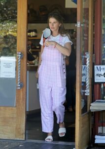 Katherine Schwarzenegger in a Pink and White Plaid Overalls