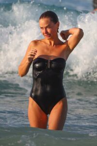 Lara Bingle in a Black Swimsuit