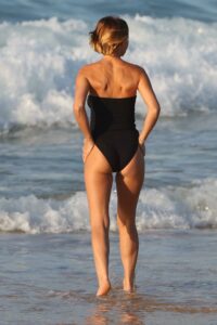 Lara Bingle in a Black Swimsuit