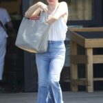 Milla Jovovich in a White Tank Top Was Seen Out in Los Angeles 09/03/2022