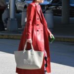 Anna Wintour in a Red Leather Coat Arrives at JFK Airport in New York 10/10/2022