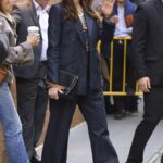 Anne Hathaway in a Denim Pantsuit Leaves The View in New York 10/12/2022