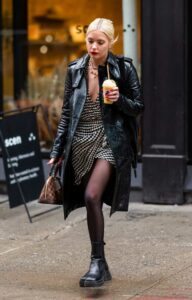 Ashley Benson in a Black Leather Trench Coat