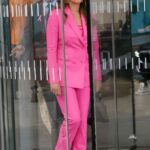 Elizabeth Hurley in a Pink Pantsuit Arrives at Chris Evans Breakfast Show in London 10/10/2022