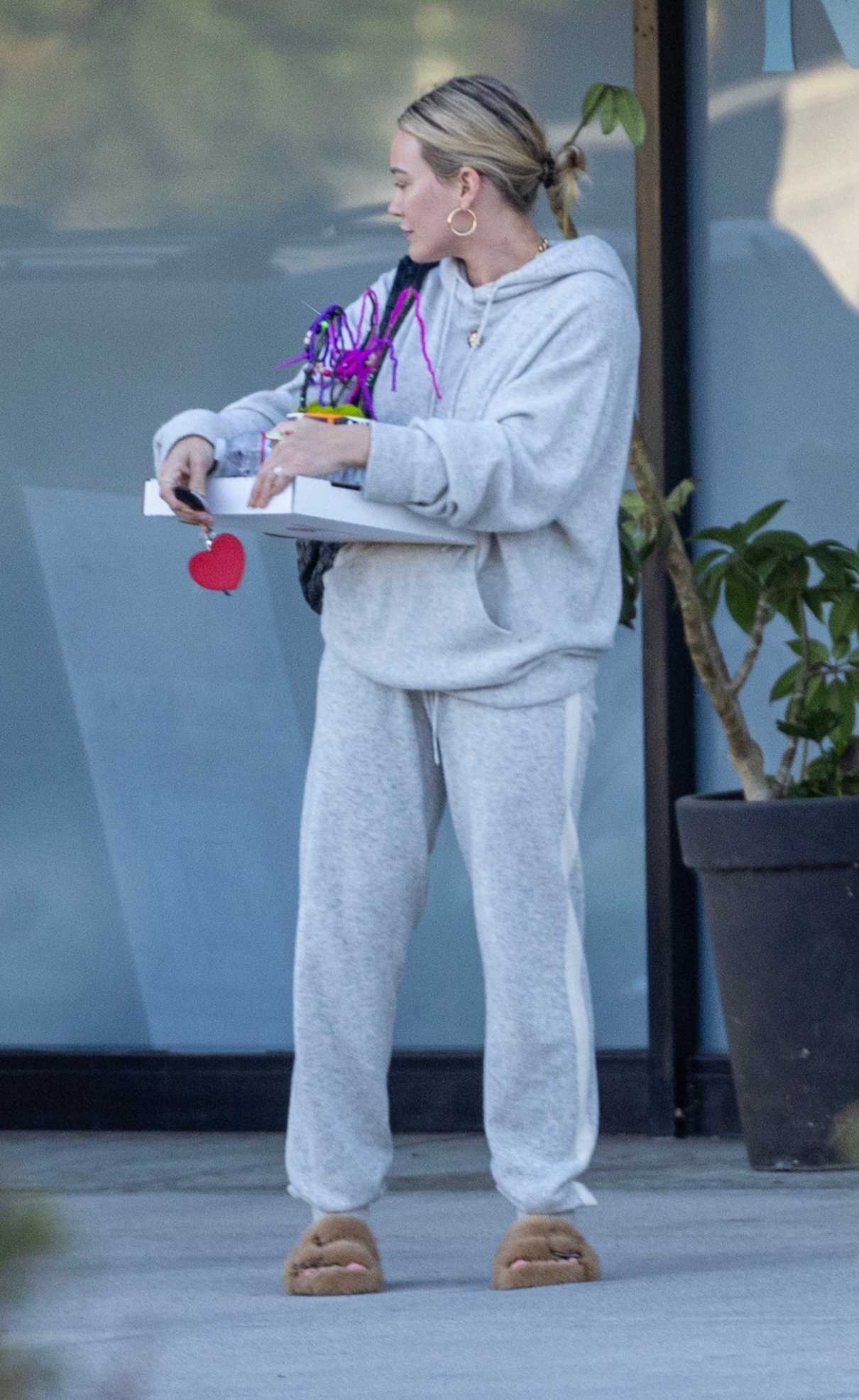 Hilary Duff in a Grey Sweatsuit