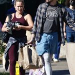 Hilary Duff in a White Sneakers with Her Family Makes a Trip to Erewhon Market in Studio City 10/30/2022