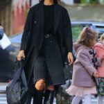 Irina Shayk in a Black Trench Coat Enjoying a Walk with Her Daughter in New York 10/28/2022