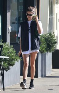 Kaia Gerber in a Black Sneakers