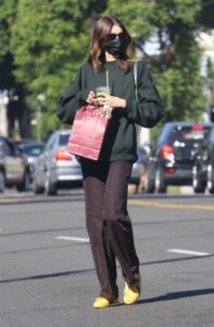 Kaia Gerber in a Yellow Sneakers