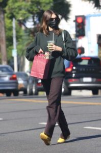 Kaia Gerber in a Yellow Sneakers