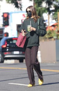 Kaia Gerber in a Yellow Sneakers