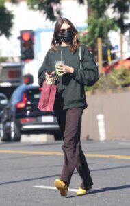 Kaia Gerber in a Yellow Sneakers