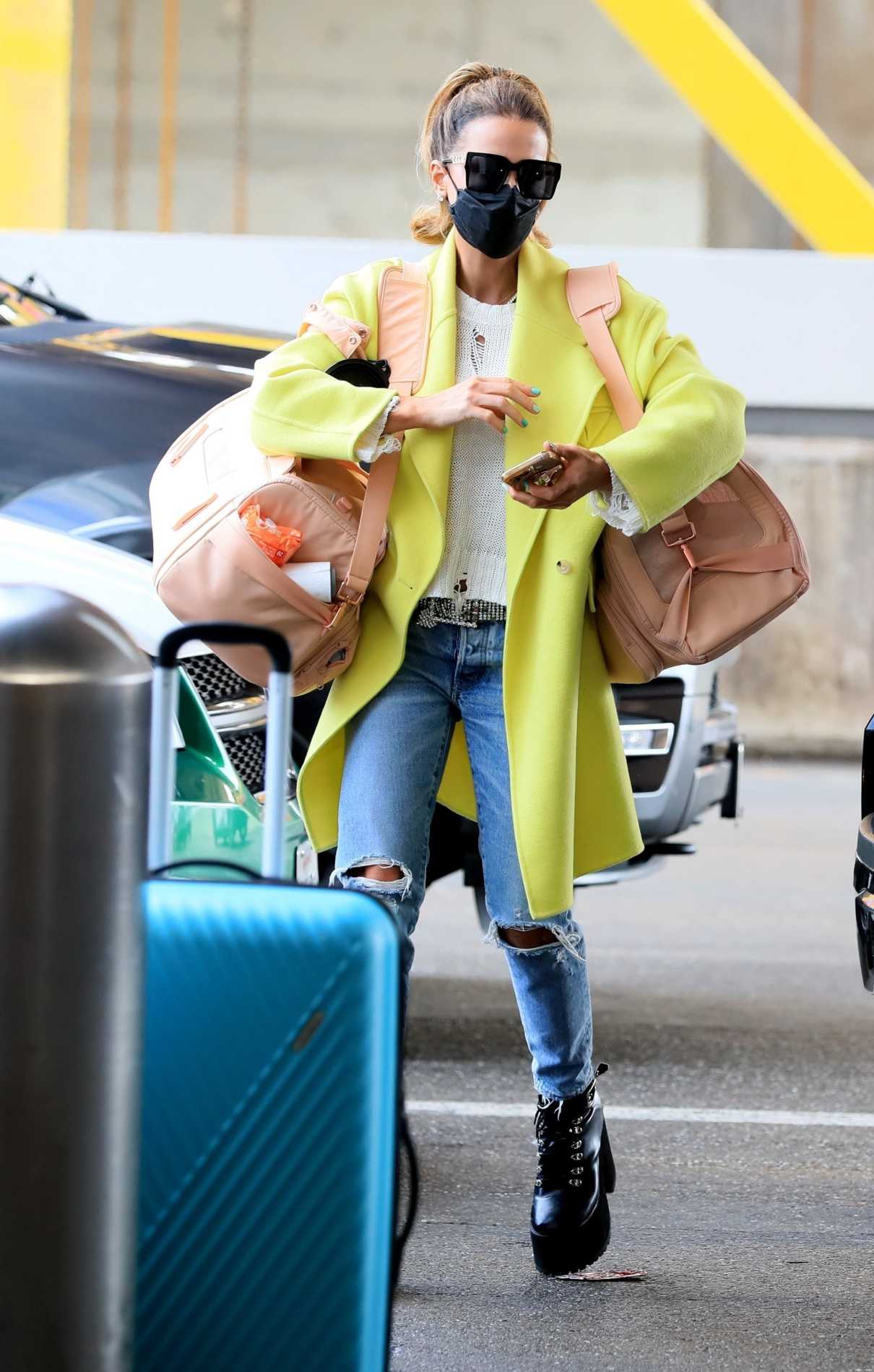 Kate Beckinsale in a Neon Yellow Coat