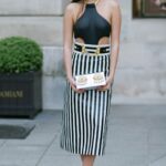 Lily Chee in a Striped Skirt Arrives at the Schiaparelli Fashion Show During 2022 Paris Fashion Week in Paris 09/29/2022