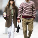 Lily Collins in a White Pants Was Seen Out with Charlie McDowell in New York City 10/25/2022