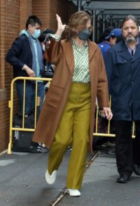 Sigourney Weaver in a Brown Coat