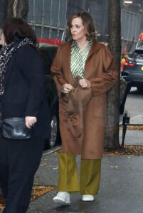 Sigourney Weaver in a Brown Coat