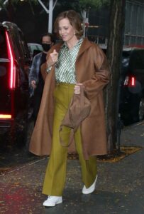 Sigourney Weaver in a Brown Coat