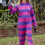 Ashley Tisdale in a Striped Jumpsuit Was Seen During a Halloween Party at Her Home in Los Angeles 10/31/2022