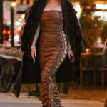 Bella Thorne in a Long Brown Satin Dress Was Seen Out in New York 11/16/2022