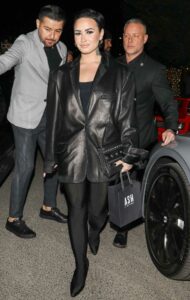 Demi Lovato in a Black Leather Blazer