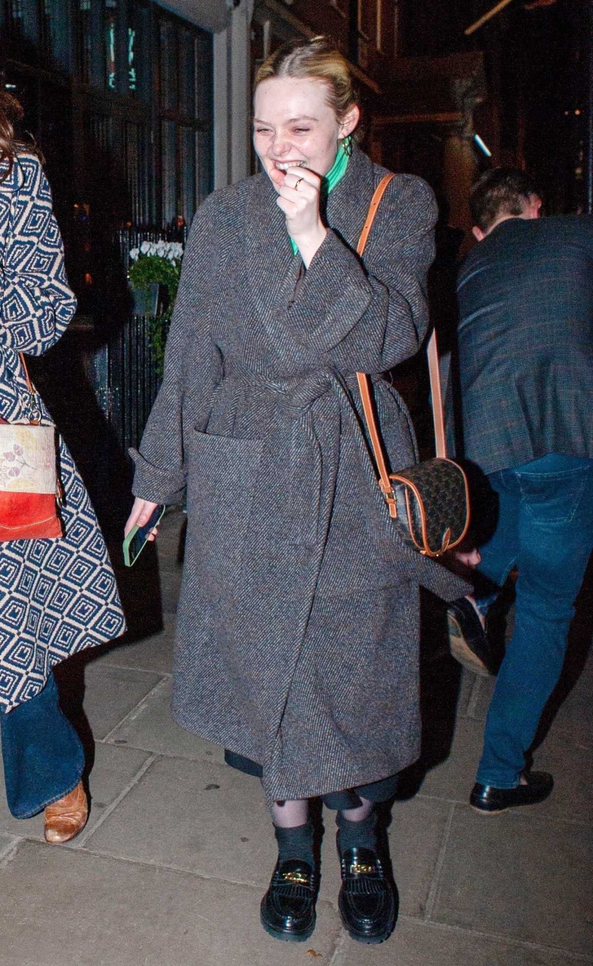 Elle Fanning in a Grey Coat