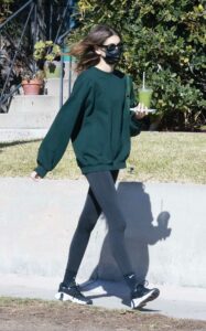 Kaia Gerber in a Green Sweatshirt