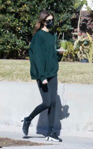 Kaia Gerber in a Green Sweatshirt