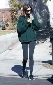 Kaia Gerber in a Green Sweatshirt