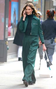 Karlie Kloss in a Green Pantsuit
