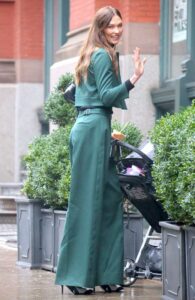 Karlie Kloss in a Green Pantsuit