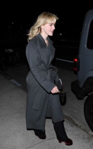 Kiernan Shipka in a Grey Coat