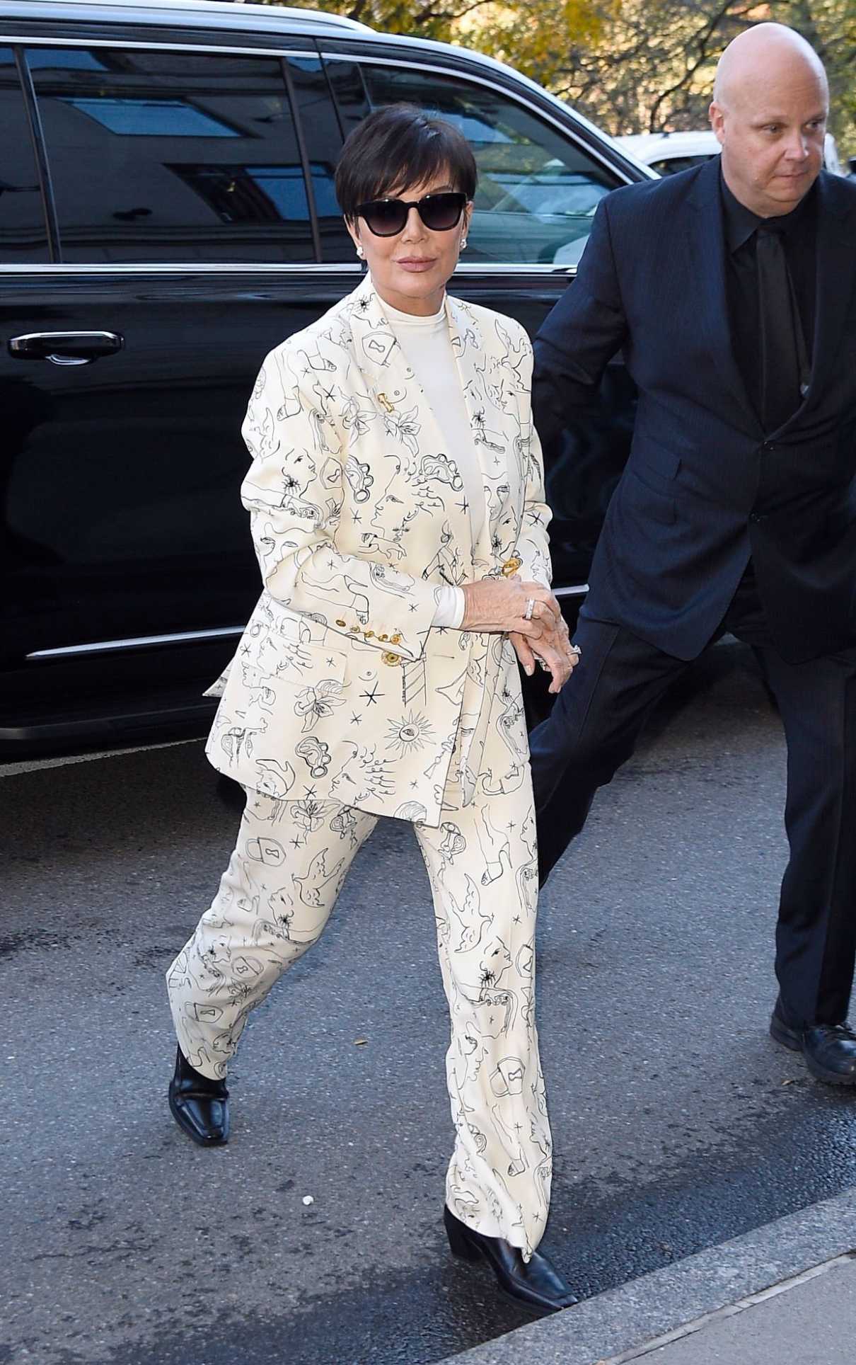 Kris Jenner in a White Patterned Pantsuit