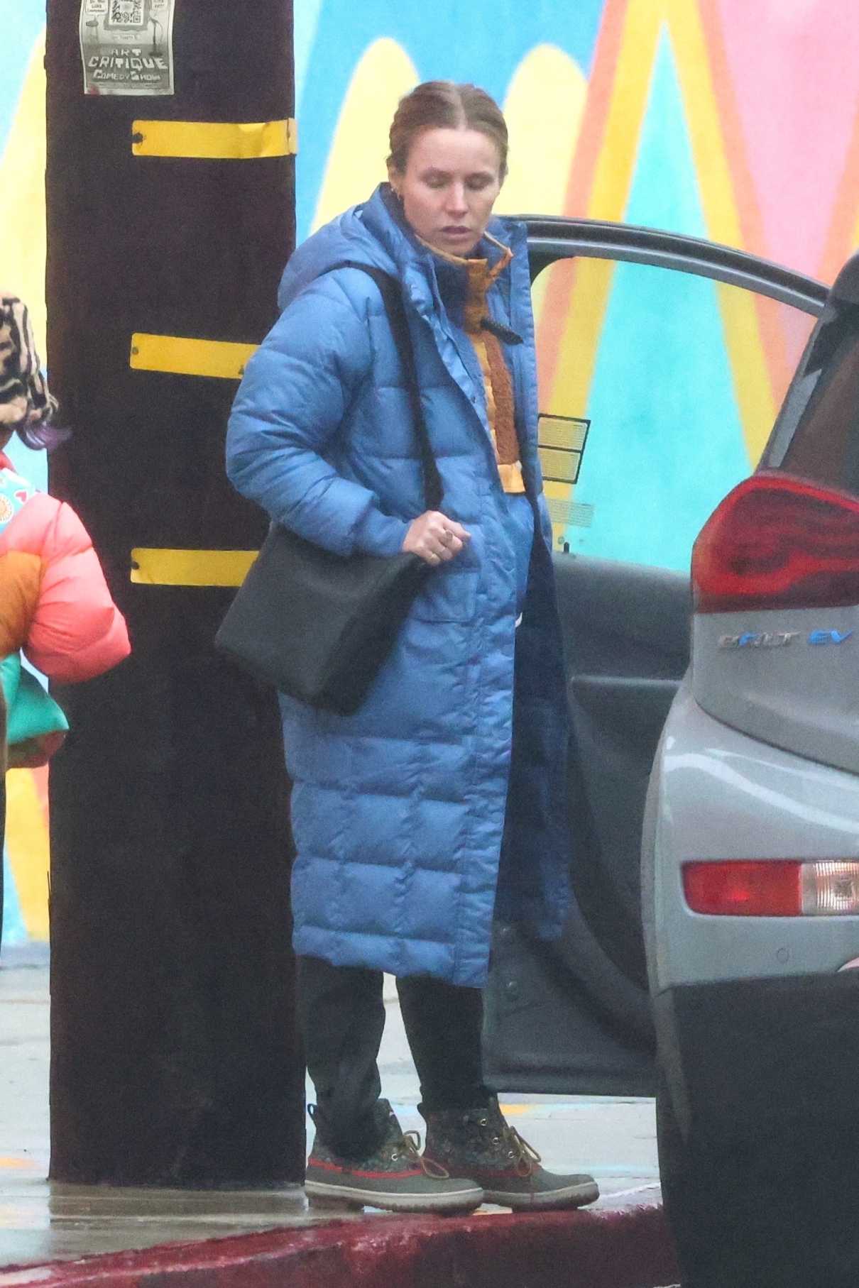 Kristen Bell in a Blue Puffer Coat