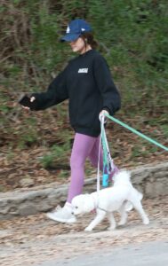 Lucy Hale in a Purple Leggings