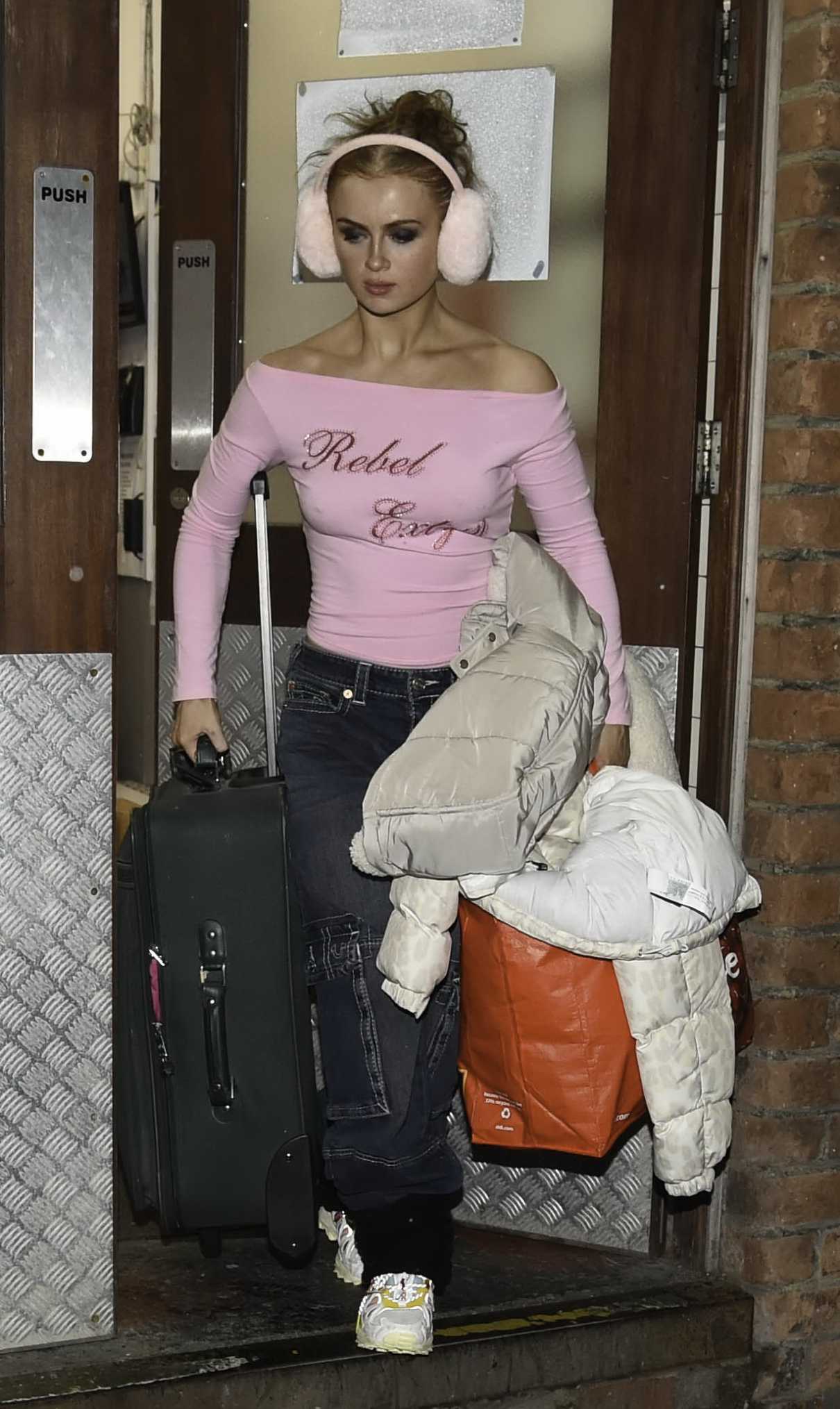 Maisie Smith in a Pink Blouse