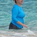 Amy Schumer in a Black Spandex Shorts on the Beach in Saint Barts 12/26/2022