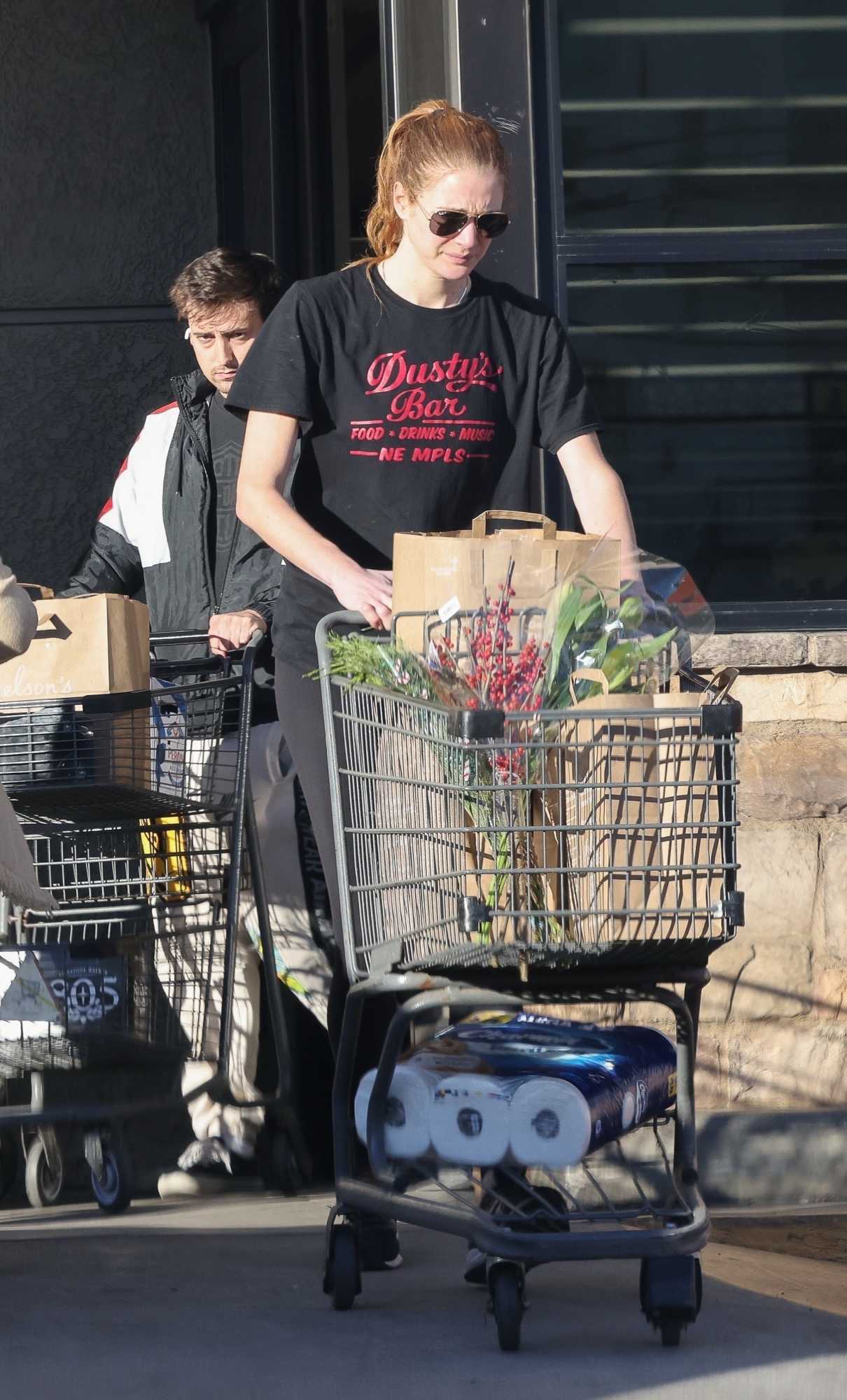 Anna Osceola in a Black Tee Exits Gelson’s After Getting Some Grocery