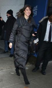 Erielle Reshef in a Black Puffer Coat