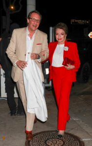 Joan Collins in a Red Pantsuit