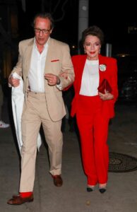 Joan Collins in a Red Pantsuit