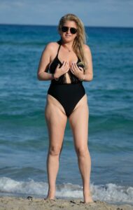 Josie Goldberg in a Black Swimsuit